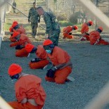 Camp_x-ray_detainees Detainees at Camp X-Ray (picture US Navy)