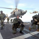 US Navy Seals deploy from a helicopter (picture Photographer's Mate 1st Class (AW) Michael W. Pendergrass / US Navy)