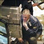 Floor trader at the New York Stock Exchange (picture Daamien at en.wikipedia)